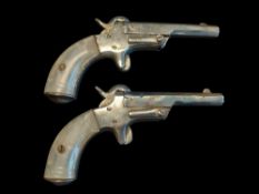 A pair of .25" PF derringer type pistols, 5.6", tip up octagonal barrels 3", sheathed triggers,