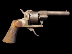 A 7mm 10 Shot Pin Fire Belgian Revolver. 4” Barrel, chequered hardwood grips. Overall length 9.4”