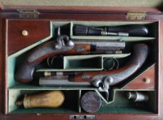 Walsh of Dublin A Cased Pair of Irish 48-Bore Percussion Overcoat Pistols by Walsh, Dublin.