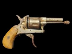 Nickel Plated Rimfire Revolver .155”. Scalloped cylinder, folding trigger, hardwood grips.
