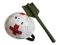OLD MILITARY HELMET AND TRENCH SHOVEL
