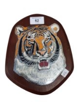 ENAMEL FACE OF A TIGER MOUNTED ON WOOD, ORIGINALLY A TRANSPORT COMPANY LOGO OFF THEIR LORRIES