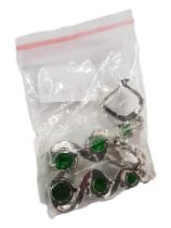 PAIR OF GREEN CRYSTAL SET EARRINGS