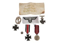 BAG LOT OF REPRODUCTION THIRD REICH BADGES/MEDALS ETC