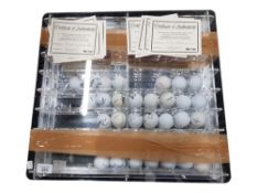 CASED QUANTITY OF VARIOUS SIGNED GOLF BALLS