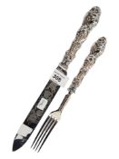 ORNATE SILVER SERVING KNIFE & FORK - BIRMINGHAM 1869 - 70 KNIFE 30CM & FORK 24CM - 218 GRAMS