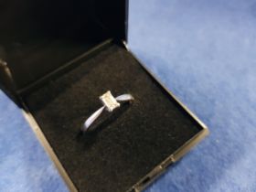 18 CARAT WHITE GOLD AND DIAMOND SOLITAIRE RING, EMERALD CUT - 0.35 CARAT