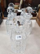 4 CUT GLASS DECANTERS (1 WATERFORD) & TEA LIGHT