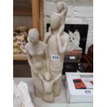 CARVED STONE FAMILY FIGURE GROUP
