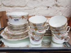 ANTIQUE CHINA TEASET AND MIRRORED TRAY