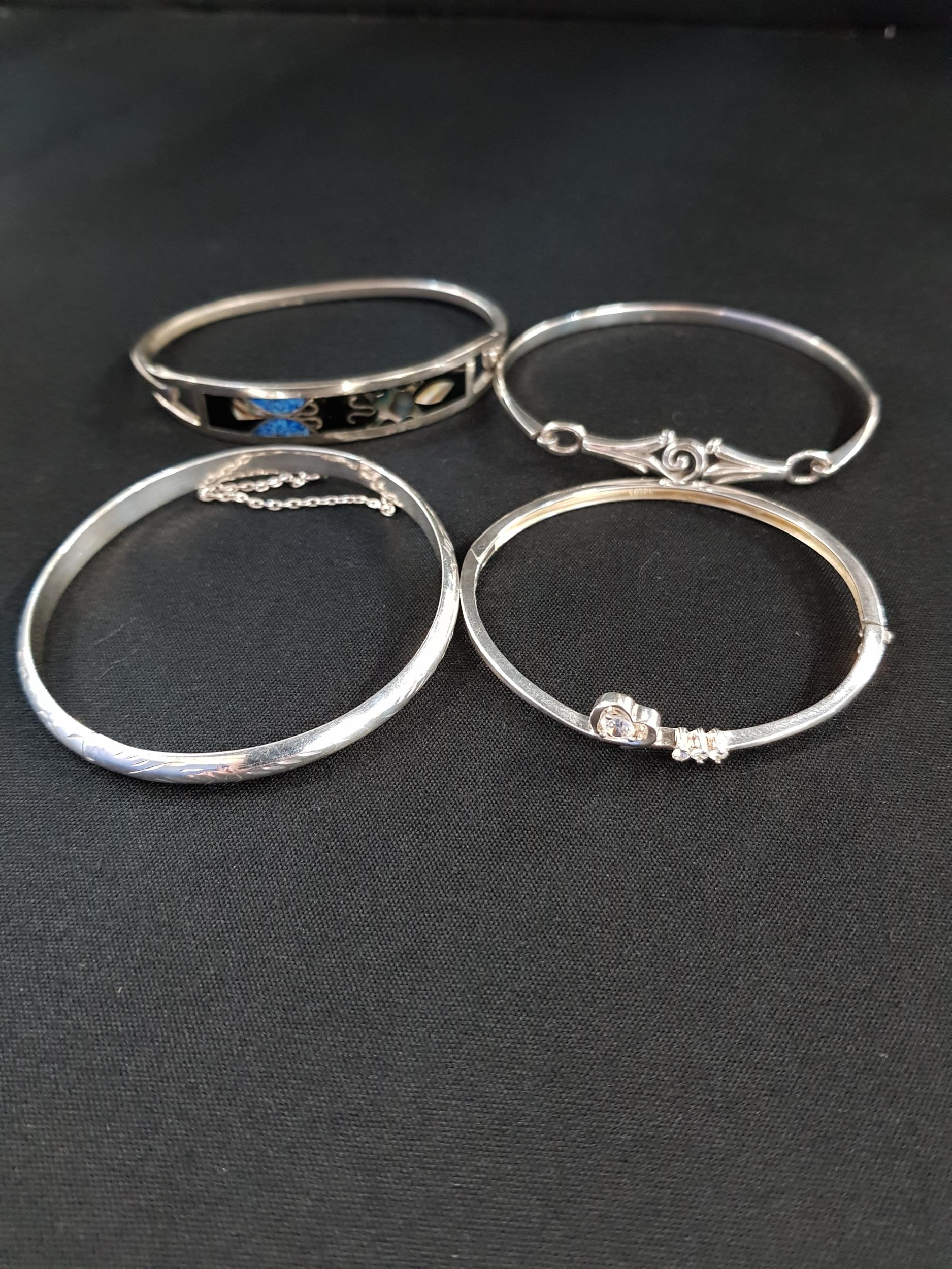 4 SILVER BRACELETS