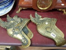 PAIR OF OLD BRASS HELMET WALL PLAQUES