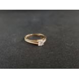 9 CARAT GOLD DIAMOND SOLITAIRE RING WITH CIRCA 0.25 CARAT OF DIAMOND