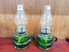 PAIR OF GREEN GLASS FINGER LAMPS WITH GLOBES