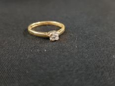 18 CARAT YELLOW GOLD DIAMOND SOLITAIRE RING WITH 0.25 CARAT OF DIAMOND
