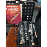 CASED CLARINET, MUSIC BOOKLET & STAND