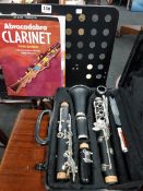 CASED CLARINET, MUSIC BOOKLET & STAND