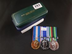 SET OF MEDALS - ROYAL ULSTER CONSTABULARY ONE ONE MEDAL IT IS SERGT BRIAN MAGEE AND THE OTHER IS