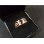 9 CARAT GOLD AND GARNET RING