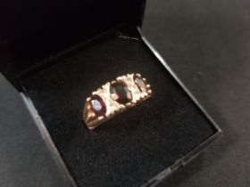 9 CARAT GOLD AND GARNET RING