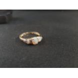 9 CARAT GOLD OPAL AND DIAMOND RING