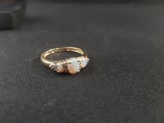 9 CARAT GOLD OPAL AND DIAMOND RING