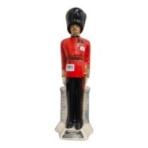 GRENADIER GUARDS PORCELAIN DECANTER (EMPTY) 17" TALL
