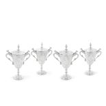 A SET OF FOUR VICTORIAN TWO-HANDLED PRESENTATION CUPS James Dixon & Sons, Sheffield marks 1877, 1...
