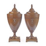 A PAIR OF GEORGE III MAHOGANY KNIFE URNS (2)