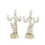 A PAIR OF SCHIERHOLZ FLORAL ENCRUSTED PORCELAIN THREE-BRANCH CANDELABRA Late 19th century