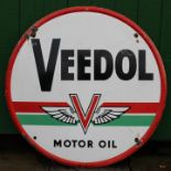 A Veedol enamel sign,