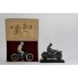 A pewter 'motorcyclist' statuette, (2)