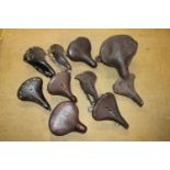 Ten bicycle/motorcycle saddles, (Qty)