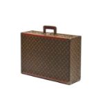 A Louis Vuitton suitcase 17 X 60 X 42 cm