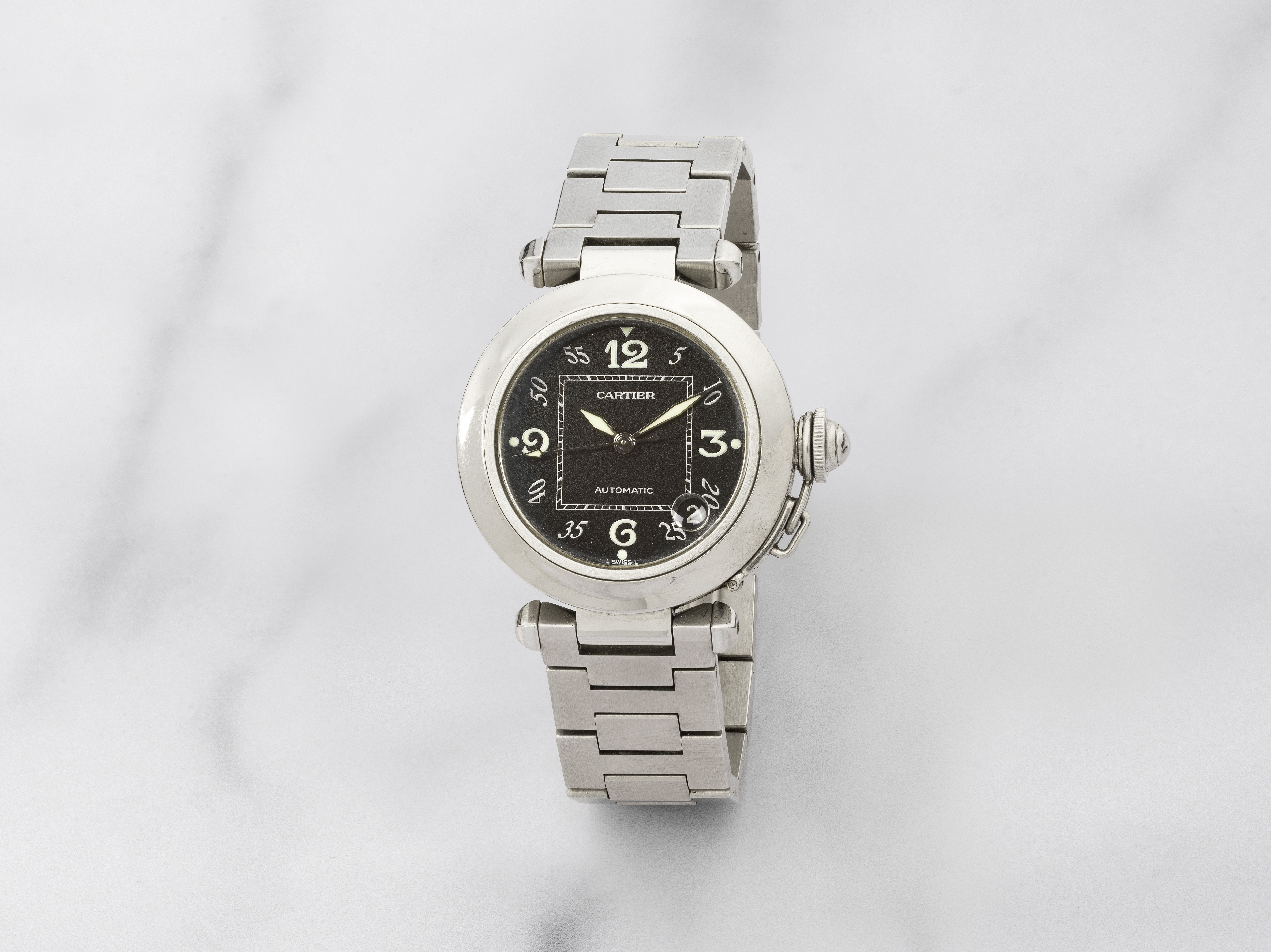 Cartier. Montre bracelet en acier avec date mouvement automatique Cartier. A stainless steel aut...