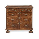 An early 18th century walnut and banded chest