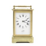 A late 19th / early 20th century French 'giant' brass carriage clock the dial signed J W Benson,...