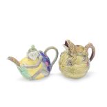 A Minton majolica monkey teapot and cover together with a majolica frog and melon jug the teapot...