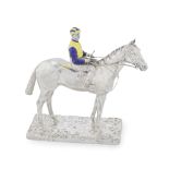 A silver and enamel figure group of a jockey and racehorse Elkington & Co, Birmingham 1911