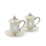 A pair of Turkish silver-gilt chocolate cups with covers and saucers Ottoman Empire late ninetee...