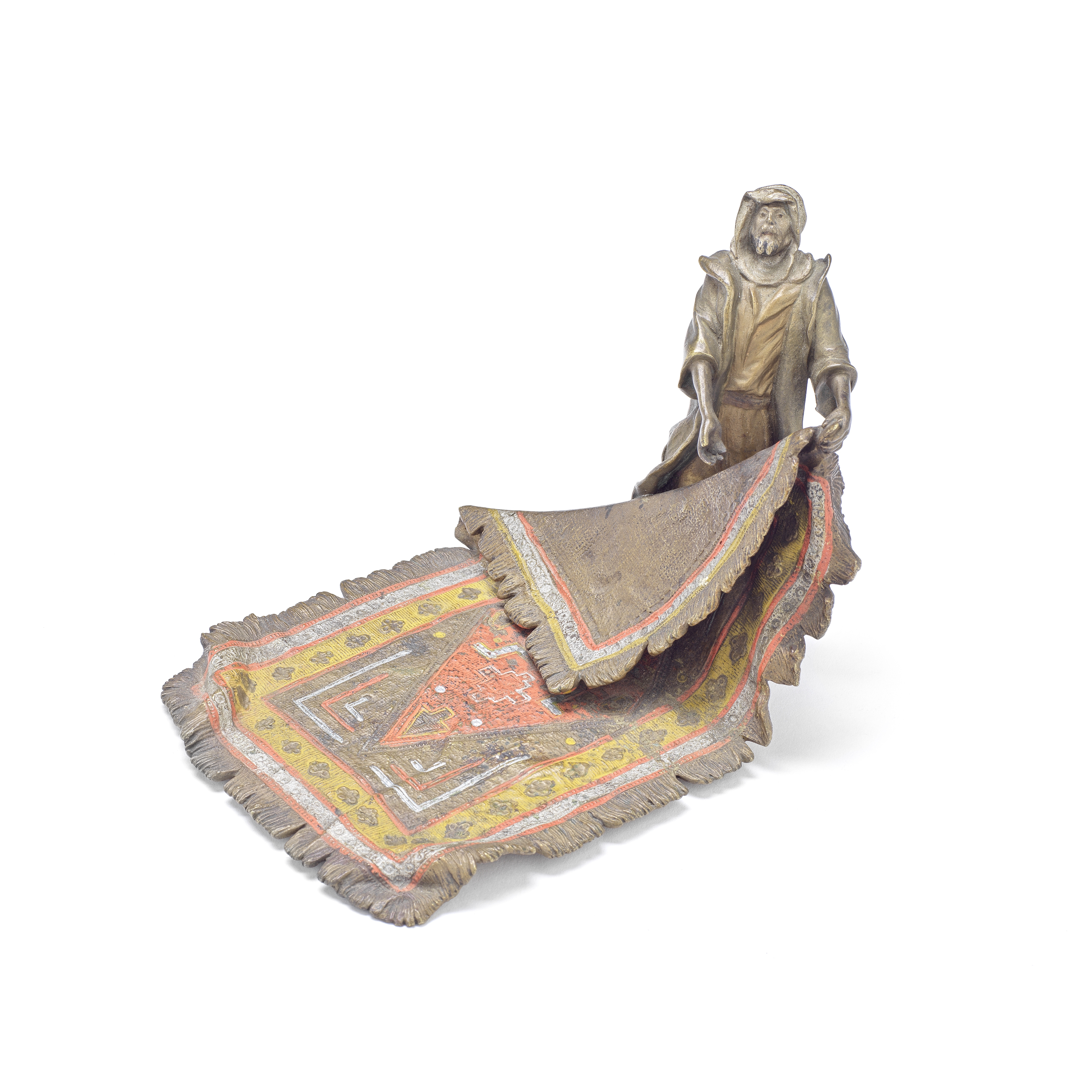 Franz Xavier Bergman (Austrian, 1861-1936): A cold painted bronze model of a carpet seller