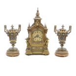 A matched late 19th century French gilt brass and champlev&#233; enamel clock garniture the clo...