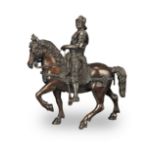 After Andrea del Verrocchio (Italian, 1435-1488): A decorative patinated bronze equestrian figur...