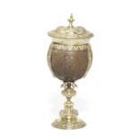 A silver-gilt mounted covered coconut standing cup George Nathan & Ridley Hayes, Chester 1912