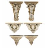 Two pairs of 19th century composition and wood figural wall brackets and a further pair of wall ...