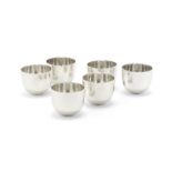 A good set of six silver tumbler cups Tessier, London 2000, also with additional Millenium mark,...