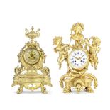 A late 19th century French gilt spelter figural mantel clock together with a similar period Fren...