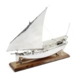 A monumental silver model of a traditional Arabian sailing dhow Garrard & Co Ltd, London 1985