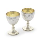 A Russian silver egg / travelling vodka cups maker's mark rubbed, Moscow 1882-1899, 84 standard