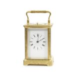 A late 19th century French gilt brass carriage clock with repeat the movement numbered 402 (2)